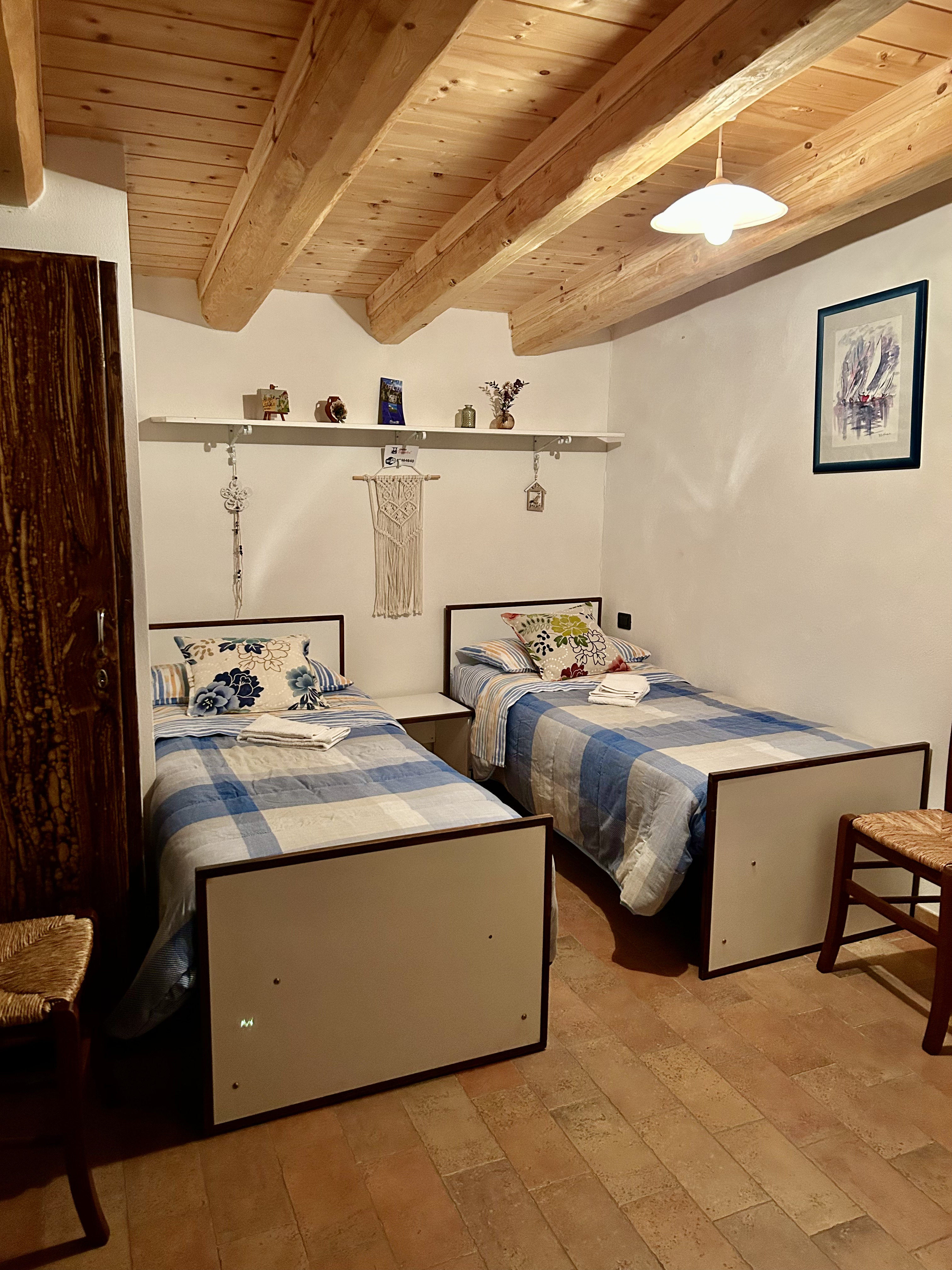 Camera 5 del Mulino Brandolini — camera familiare con travatura originale